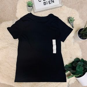 Woman’s black t-shirt.